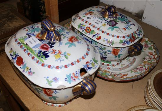 A pair of Victorian ironstone lidded tureens (both damaged)